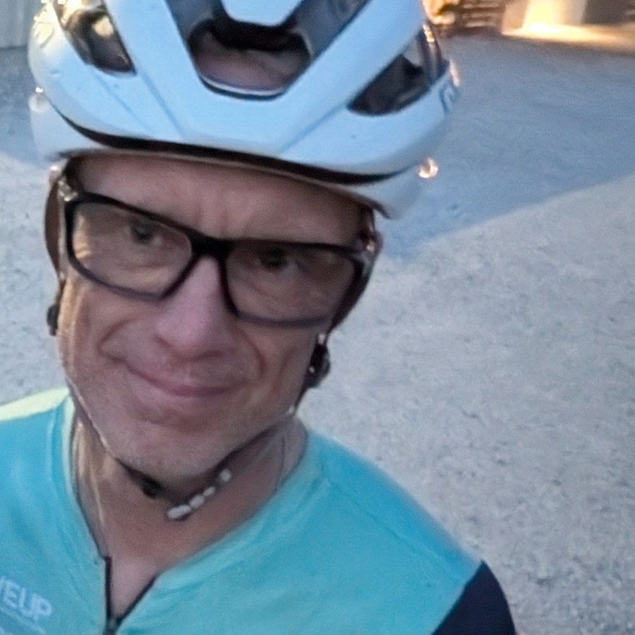 Roger Williams, USA Cycling Level 3 Certified Coach, on a training ride with Amanda Duling