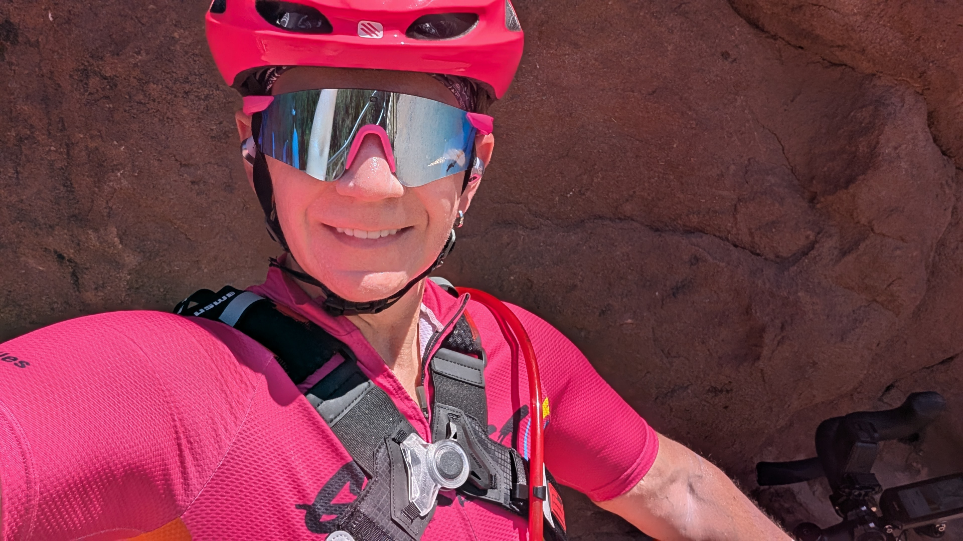 Amanda Duling, Founder and Head Coach of More Than Miles, in cycling gear ready to coach